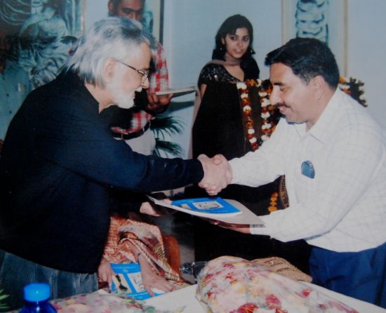 Taking AIFACS Award from Shri Satish Gujral