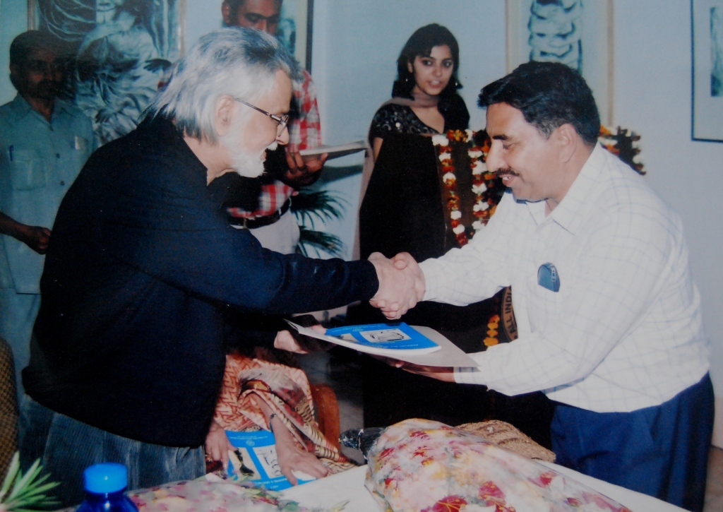 Taking AIFACS Award from Shri Satish Gujral
